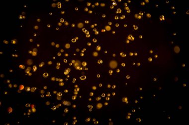 Defocus bokeh simli altın antika ışıklar koyu arkaplan