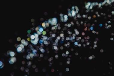 siyah arka plan üzerinde renkli bokeh