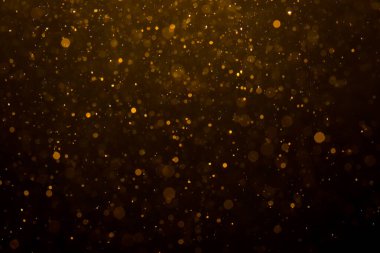 Siyah arkaplan ile soyut altın bokeh