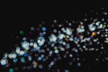 siyah arka plan üzerinde renkli bokeh