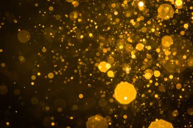 Soyut bulanık altın parıltılı bokeh arkaplan