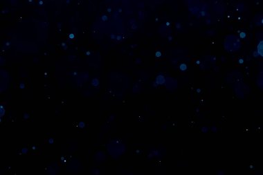 Siyah arkaplan ile soyut bulanık mavi parlayan bokeh