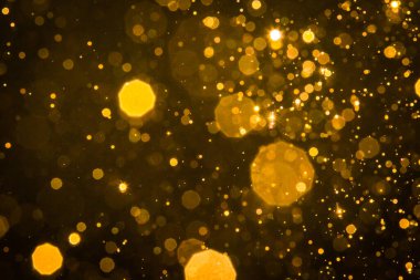 Soyut bulanık altın parıltılı bokeh arkaplan