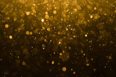 Siyah arkaplan ile soyut altın bokeh