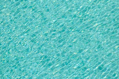 Mavi havuz arka planında ışık dalgası yansıması