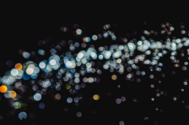 siyah arka plan üzerinde renkli bokeh