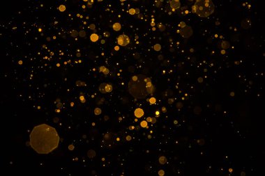 Soyut bulanık altın parıltılı bokeh arkaplan