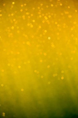 Su arka planında soyut altın ve beyaz bokeh ve kabarcıklar