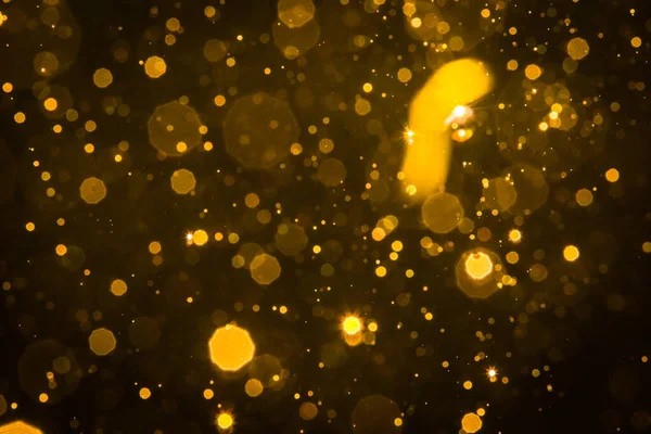 Soyut bulanık altın parıltılı bokeh arkaplan