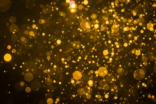 Soyut bulanık altın parıltılı bokeh arkaplan