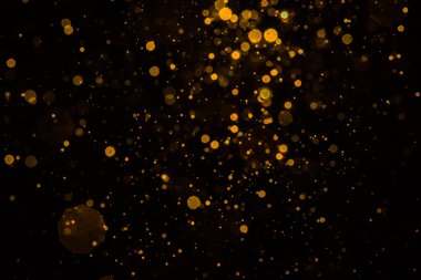 Soyut bulanık altın parıltılı bokeh arkaplan