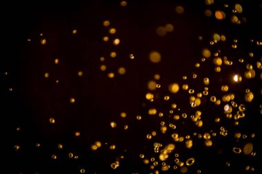 Defocus bokeh simli altın antika ışıklar koyu arkaplan