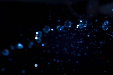 Siyah arkaplan üzerine soyut lüks bokeh