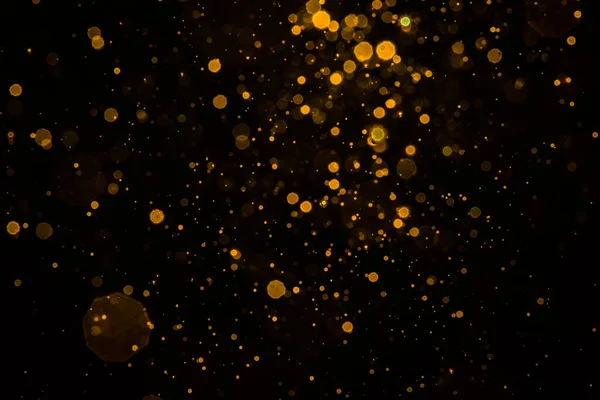 Soyut bulanık altın parıltılı bokeh arkaplan
