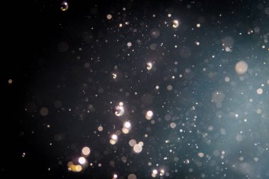 Soyut glitter bokeh siyah arka plan üzerine