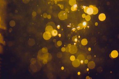 Lüks Altın, siyah arkaplanda soyut bir bokeh