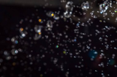 Siyah arkaplan üzerine soyut lüks bokeh