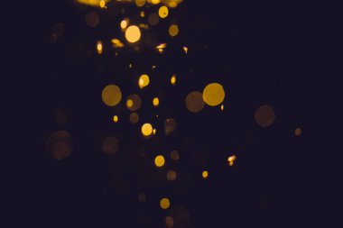 Lüks Altın, siyah arkaplanda soyut bir bokeh