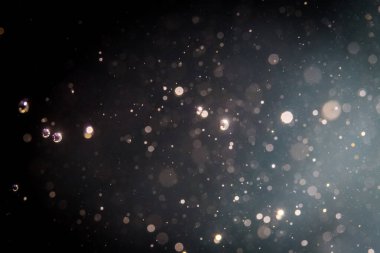 Soyut glitter bokeh siyah arka plan üzerine