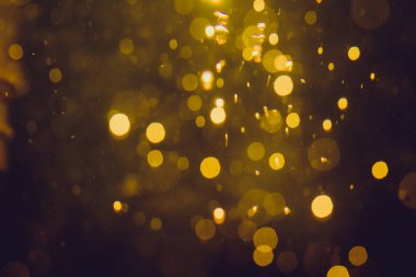 Lüks Altın, siyah arkaplanda soyut bir bokeh