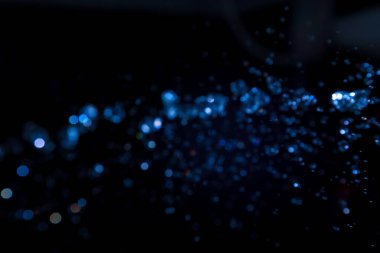 Siyah arkaplan üzerine soyut lüks bokeh