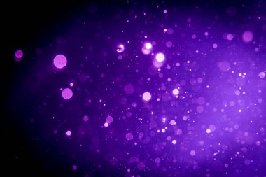 Soyut mor, siyah üzerine mor bokeh.