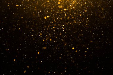 Siyah arkaplan ile soyut altın bokeh