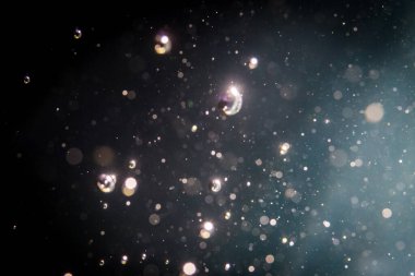 Soyut glitter bokeh siyah arka plan üzerine
