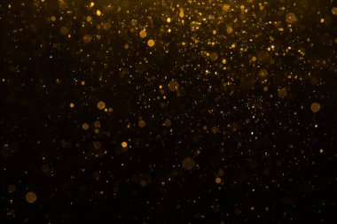 Siyah arkaplan ile soyut altın bokeh