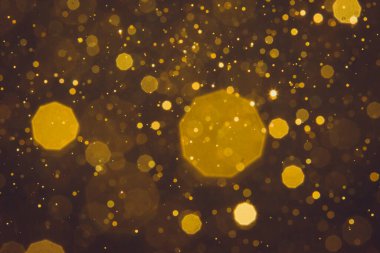 Soyut bulanık altın parıltılı bokeh arkaplan