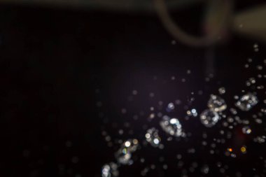 Siyah arkaplan üzerine soyut lüks bokeh