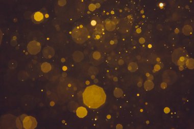 Soyut bulanık altın parıltılı bokeh arkaplan