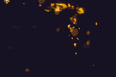 Lüks Altın, siyah arkaplanda soyut bir bokeh