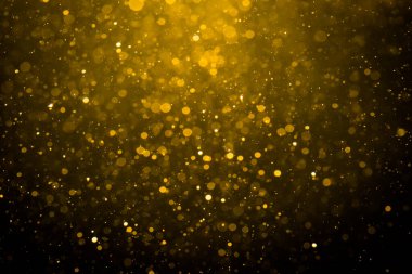 Siyah arkaplan ile soyut altın bokeh