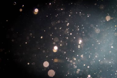 Soyut glitter bokeh siyah arka plan üzerine