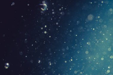 Soyut glitter bokeh siyah arka plan üzerine