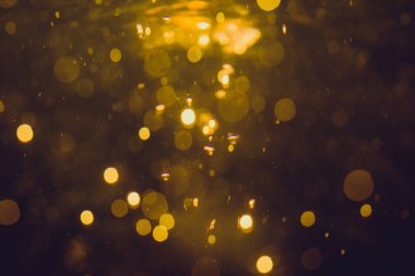 Lüks Altın, siyah arkaplanda soyut bir bokeh