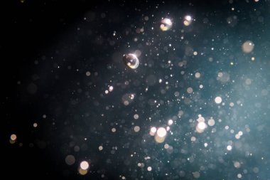 Soyut glitter bokeh siyah arka plan üzerine