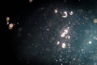 Soyut glitter bokeh siyah arka plan üzerine