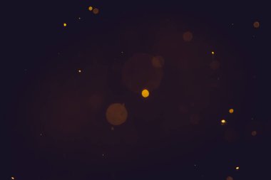 Siyah arkaplanda koyu soyut altın bokeh parıltısı