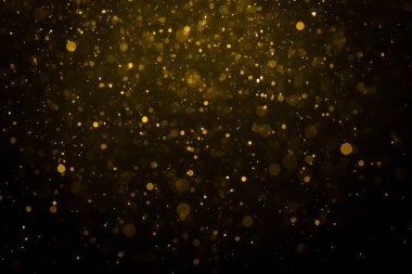 Siyah arkaplan ile soyut altın bokeh