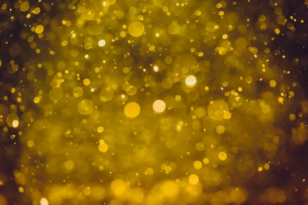 抽象的なライト豪華な金のボケの背景 — ストック写真