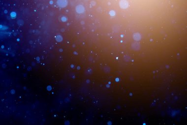 Siyah arkaplanda bulanık mavi ışık bokeh