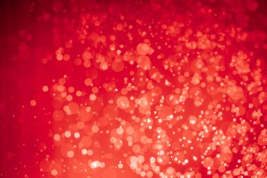 Soyut kırmızı noel simli ışıklar Bokeh arkaplanının odaklanmasını engeller