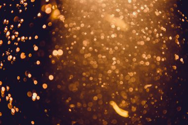 Soyut altın defocus bokeh simli vintage ışıklar siyah arkaplan