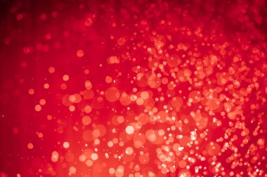 Soyut kırmızı noel simli ışıklar Bokeh arkaplanının odaklanmasını engeller