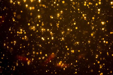 Mutlu Noeller ve yeni yıl arkaplanı için altın rengi parıltılı ışıklar soyut bokeh