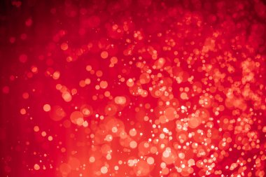 Soyut kırmızı noel simli ışıklar Bokeh arkaplanının odaklanmasını engeller