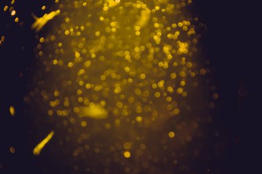 Soyut altın defocus bokeh simli vintage ışıklar siyah arkaplan