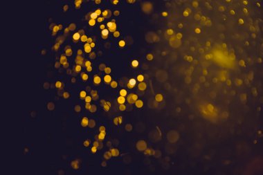 Soyut altın defocus bokeh simli vintage ışıklar siyah arkaplan